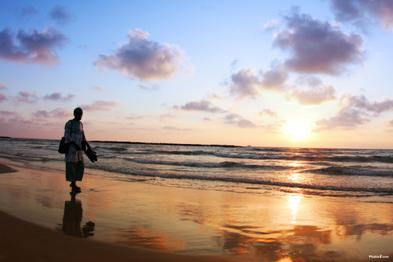 Beach Walking with Clouds Reflection