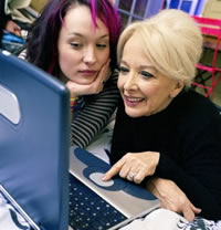 two women and a laptop