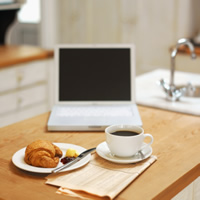 kitchen counter, snacks, and a laptop