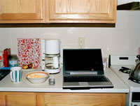 image of laptop on kitchen counter