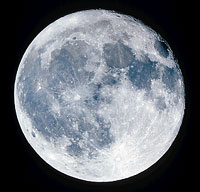 The moon's surface shows striking contrasts of light and dark. The light areas are rugged highlands. The dark zones were partly flooded by lava when volcanoes erupted billions of years ago.